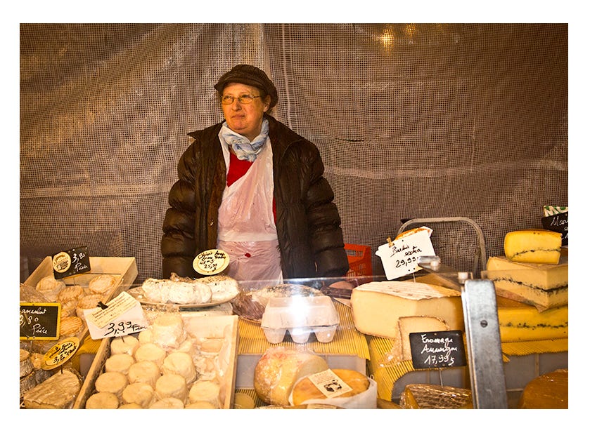 Cheese monger / fromage manger by Terry J. Allen