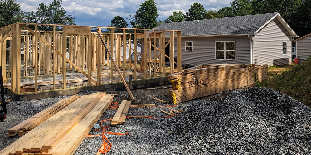 Habitat Project Benefits Rosman. And the Mayor