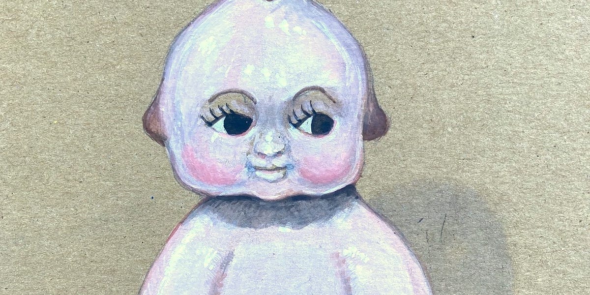 Kewpie doll head top