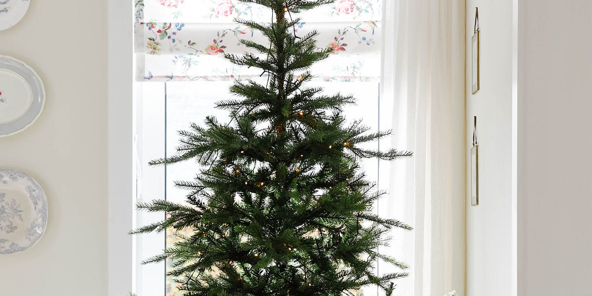 Fake vs Real Christmas Tree by Yvonne Eijkenduijn