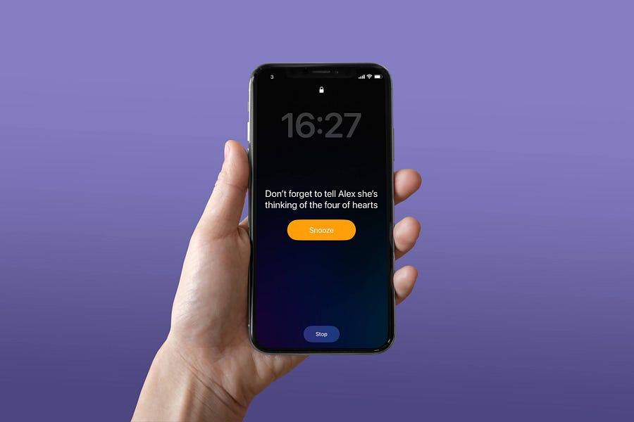 An iPhone with an alarm visible containing a written prediction