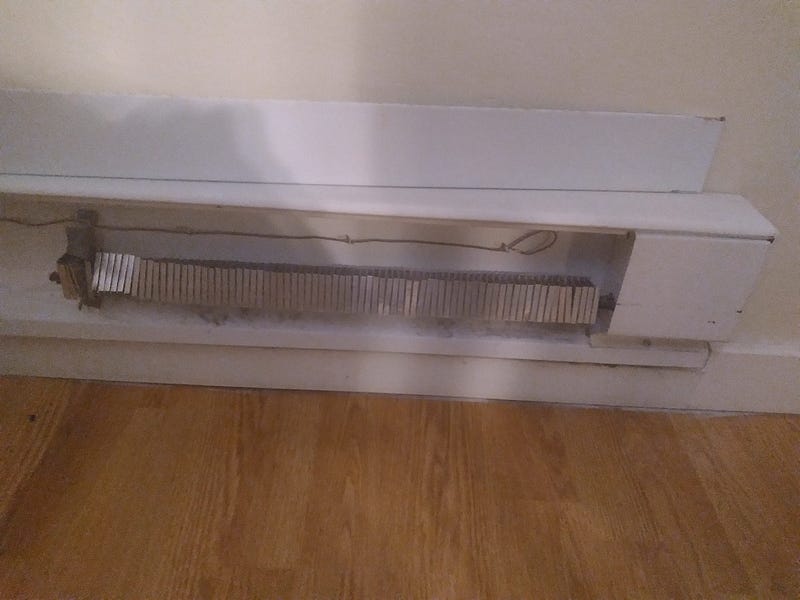 Electric baseboard heater on fire, speedy lesson in how to use a fire