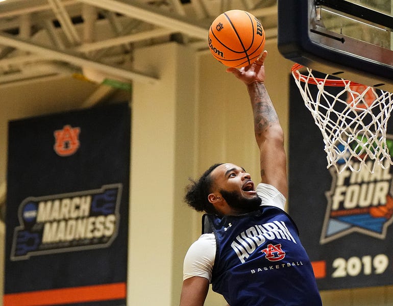 Johni Broome is getting used to Auburn basketball — and vice versa