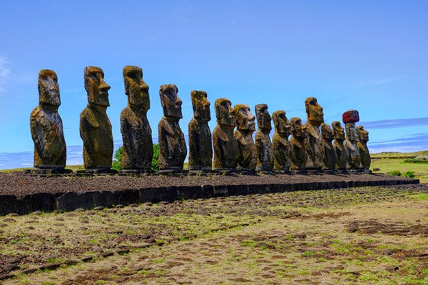 Fifteen Moai standing on an ahu at Tongariki, the most famous Moai platform of Easter Island