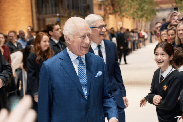 King Charles and Tim Cook share a smile with the students from St. George’s.