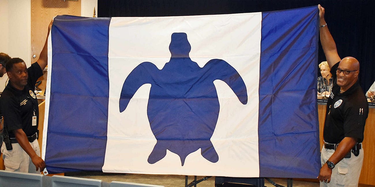 Holmes Beach Unveils New Sea Turtle Flag in Celebration of 75th Anniversary