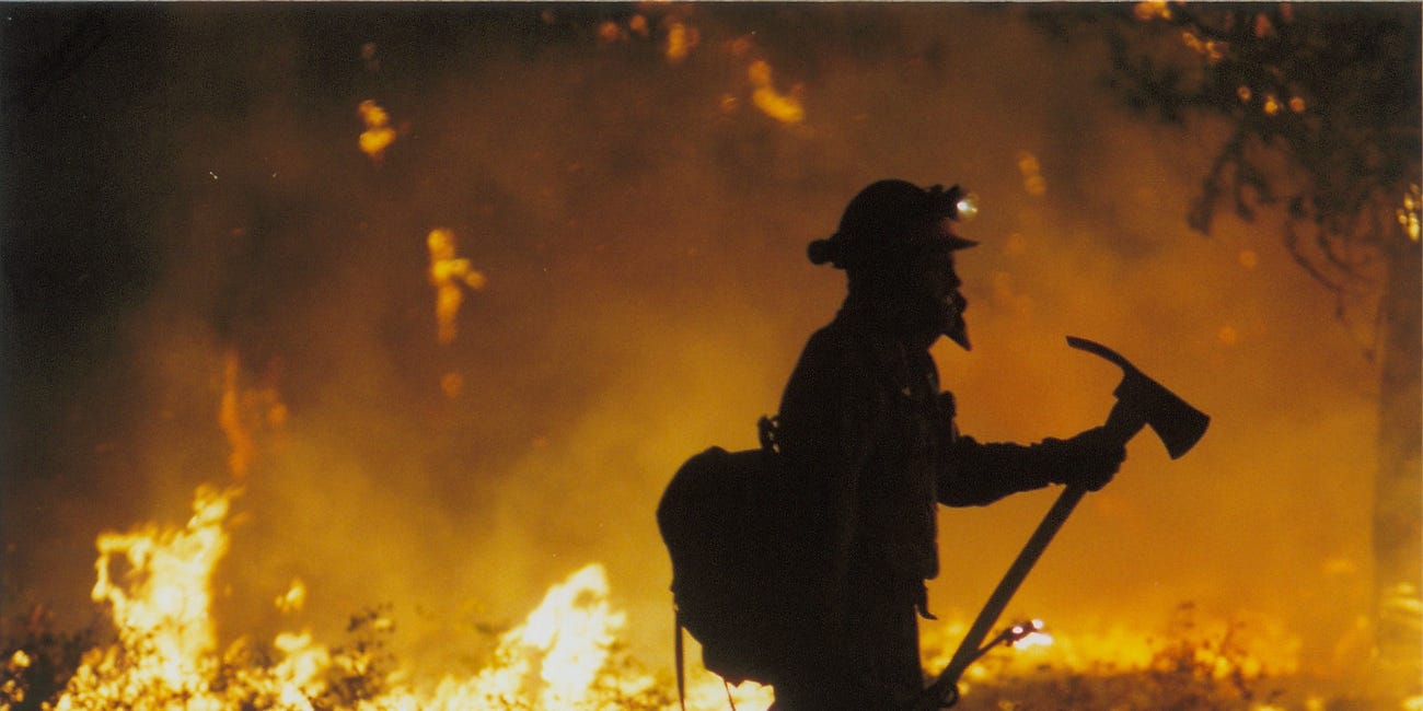 A Firefighter In The Rain
