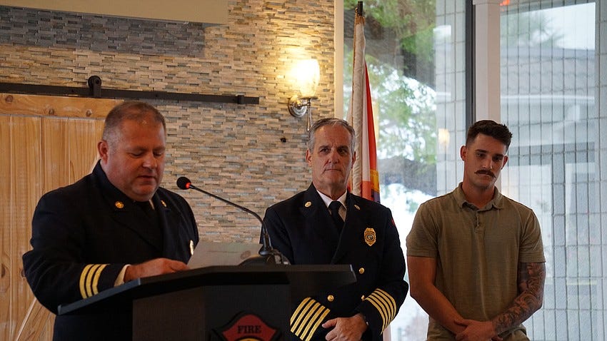 Father-Son Firefighters Honored for Thanksgiving Day Rescue