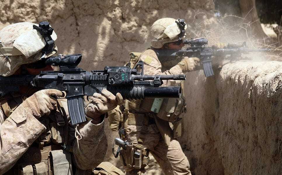 Marine stops masturbating long enough to return fire