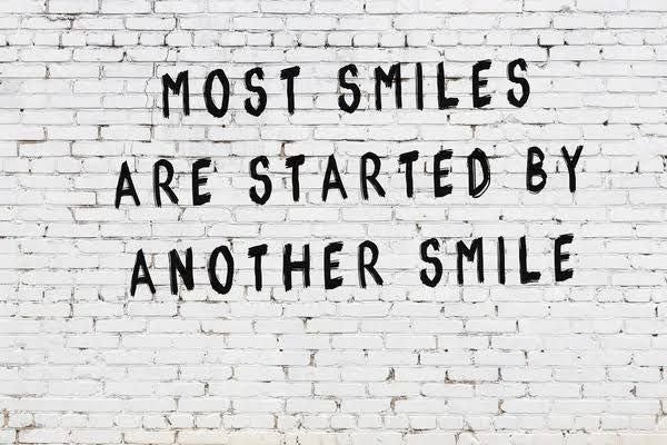 Most Smiles Are Started By Another Smile