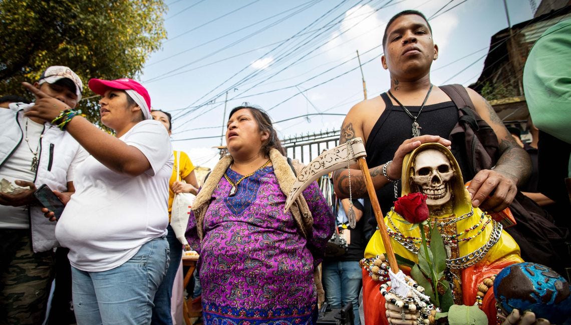 Beer and jo*nts and warm people: Santa Muerte's mass in the gangsta neighborhood