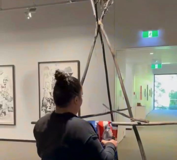 Ruth Tipu rescues national flag in protest of disrespectful art