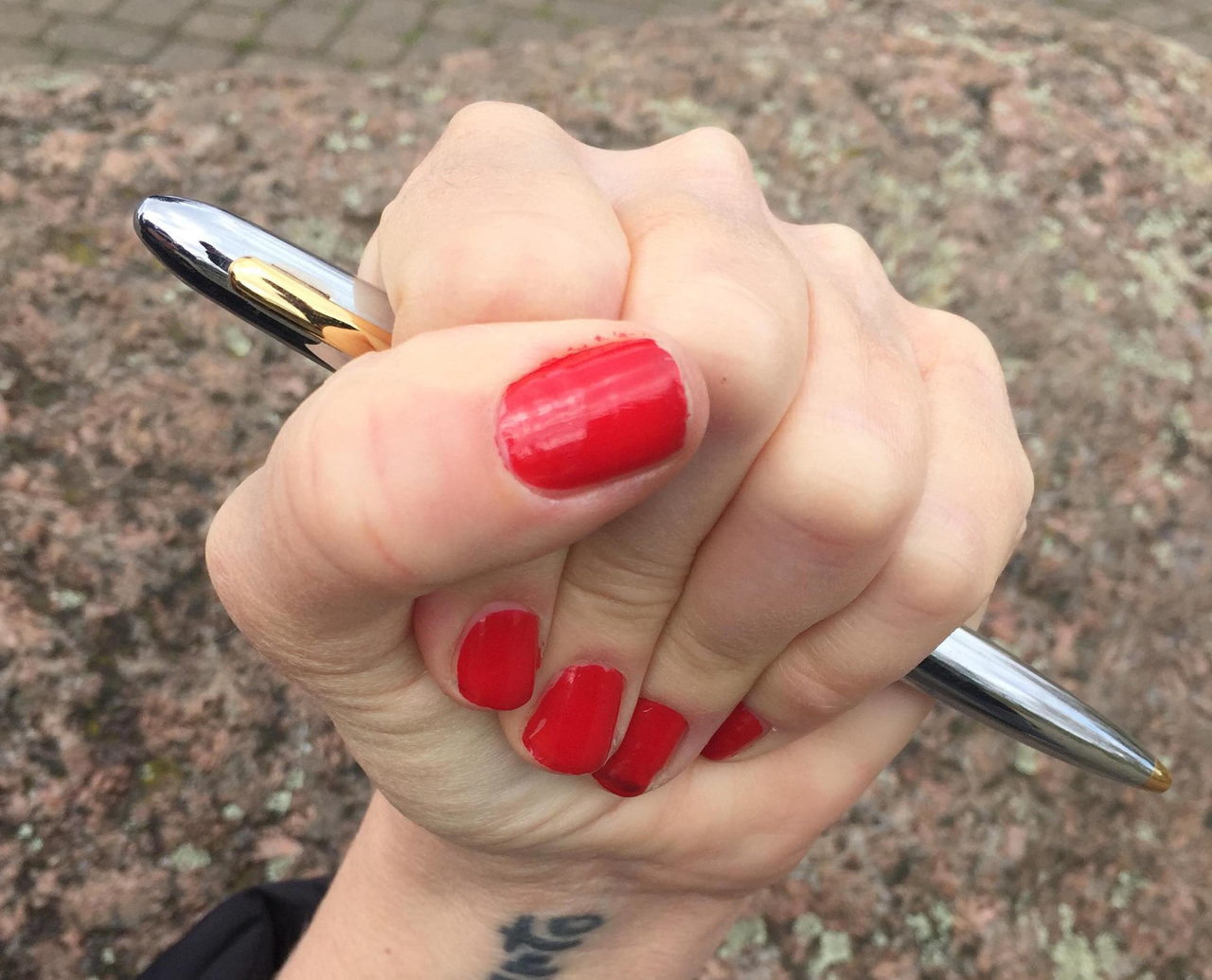 Pen in Fist 