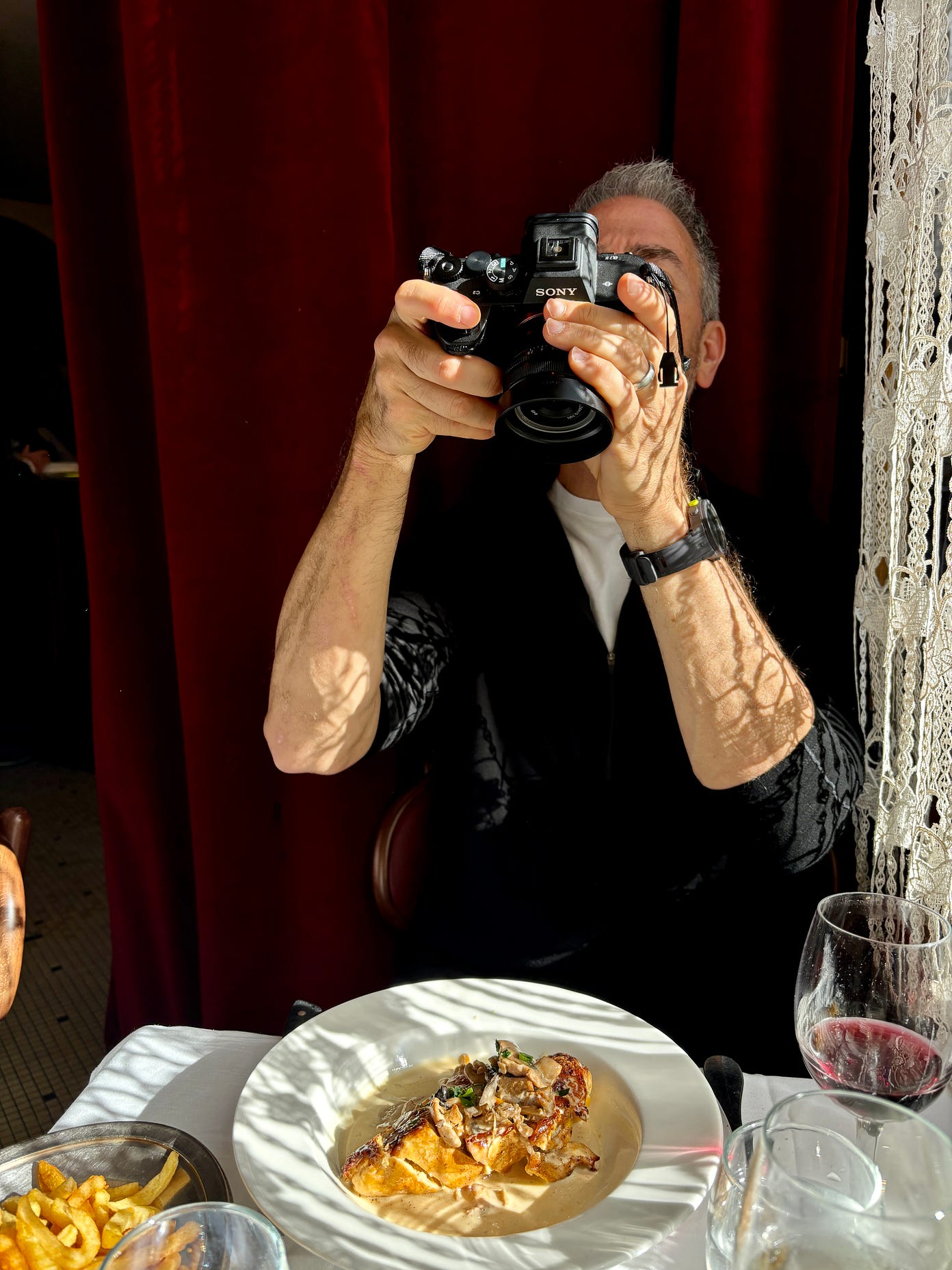 Dining with Ed Anderson, while he gets the shot.