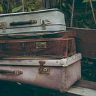 The Overstuffed Suitcase vs. Nurturing My Children