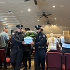Abandoned baby laid to rest, accompanied by police escort
