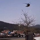 National Guard Responds To Incident Involving Black Hawk Helicopter Rotor Washing Hurricane Aid Items In North Carolina