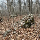Curious "Spilling" Cairn-like Stone Structures in Rhode Island
