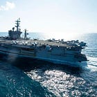 US Navy: Iranian UAV Creates Safety-of-Flight Risk to IKE Carrier Strike Group in Arabian Gulf, US AI Task Force Carry Out Manned/Unmanned Naval Live-Fire Drills