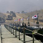 Warning Shots Fired By South Korean Soldiers After Armed North Korean Soldiers Cross Over Shared Border Line