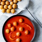 Pallotte Cacio e Ova from Abruzzo - Cheese and Egg Balls Stewed in Tomato Sauce