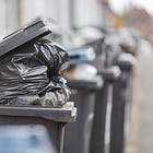 Russell Jones's Week Moment: Billionaires, Miscarriages of Capitalism, and Bin Collections