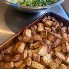 Fresh Gluten Free Garlic and Herb Croutons on a Green Goddess Salad
