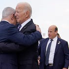 Biden's Big Hug and Quiet Punches