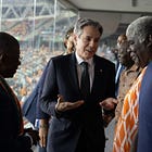 What is the top US diplomat doing at an African football event? 