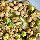 Sprouts and kale pesto butterbean stew with pangrattato