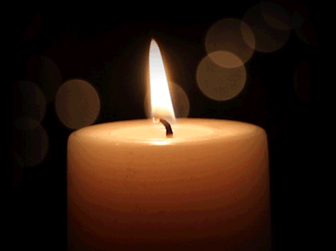 This image has an empty alt attribute; its file name is candle.gif