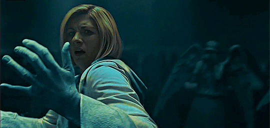 This moving image (GIF) shows the Thirteenth Doctor (played by Jodie Whittaker) transforming into a Weeping Angel in the climactic moment of "Village of the Angels." This moving image (GIF) shows the Thirteenth Doctor (played by Jodie Whittaker) transforming into a Weeping Angel in the climactic moment of "Village of the Angels."