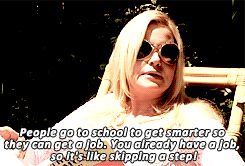 Gif of Jennifer Coolidge in "A Cinderella Story." She's sunbathing with funky sunglasses on. Captioned: "People go to school to get smarter so they can get a job. You already have a job, so it's like skipping a step!"