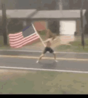 Man In Hurricane With Flag GIFs - Get the best GIF on GIPHY