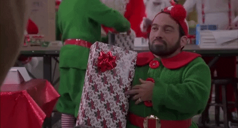 New trending GIF online: christmas movies, shrug, elf, jingle all the way, christmas  present