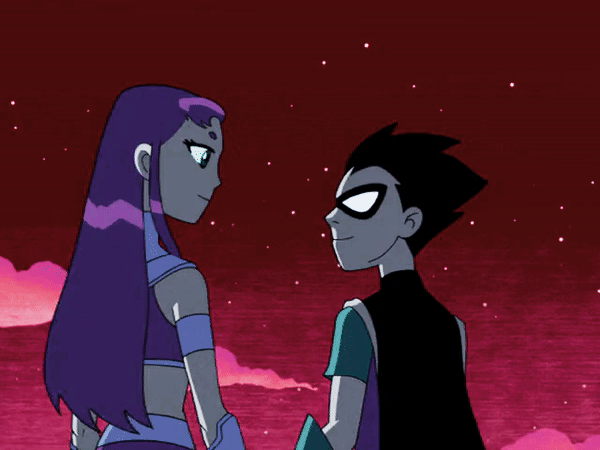 Robin and Starfire hug while standing at the edge of a canyon against a dark sky (Teen Titans, 2003)