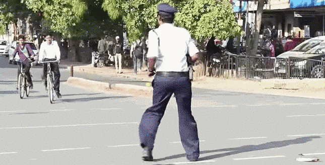 The traffic policeman lives and works in Indore, Madhya Pradesh (India ...
