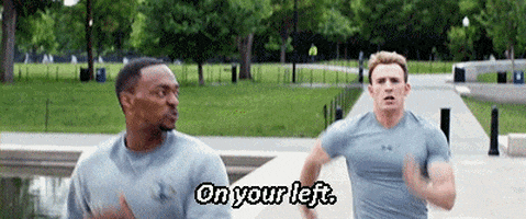 Gif of Chris Evans as Captain America running past Anthony Mackie as Sam Wilson saying "On your left."