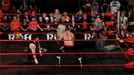 Jimmy attacks Generico with the spike while Kevin laughs.
