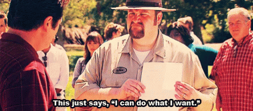 Park ranger in Parks and Rec holding a piece of paper and saying "This just says, "I can do what I want""