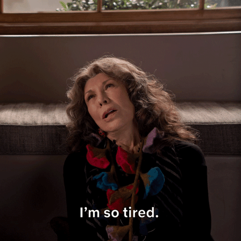 Lily Tomlin in Grace and Frankie sitting on the floor saying "I'm so tired."