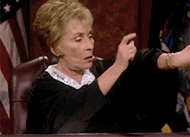 Hurry Up GIF with Judge Judy tapping watch
