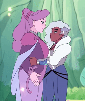 Netossa dips Spinnerella back into a kiss in a looping GIF from She-Ra: Princesses of Power
