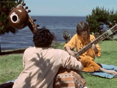 HeroInSight — Ravi Shankar and George Harrison playing sitars,...