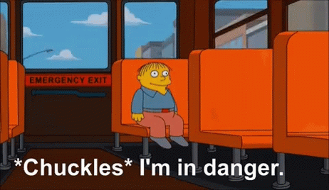 GIF of Butters from The Simpsons sitting on a school bus saying “Chuckles I’m in danger”