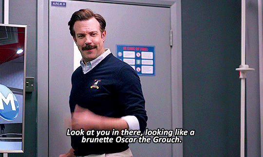 Ted Lasso saying "Look at you in there, looking like a brunette Oscar the Grouch."