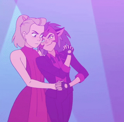 Catra and Adora are dancing together in purple light when Catra pulls Adora into a dip. Adora is frowning suspiciously, dressed in a red gown. Catra has an evil smile as she speaks.