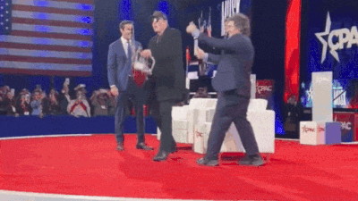 Elon Musk parades CPAC stage with chainsaw presented by Argentina President  Javier Milei | World News - The Times of India