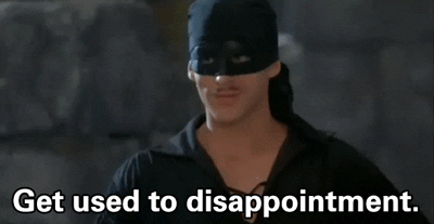 Video gif. A man parodying the Mask of Zorro says with a small smile, "Get used to disappointment."