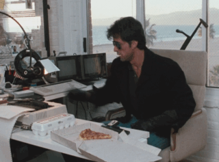 Stallone finds a new way to eat pizza in Cobra (1986)